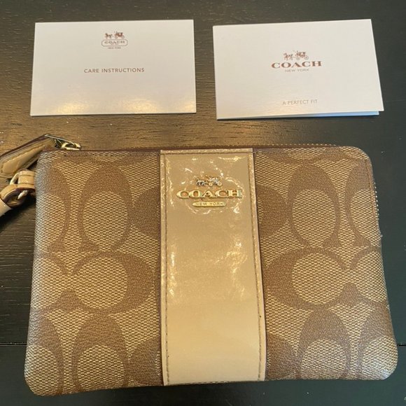 Coach Handbags - Coach wristlet tan cream and gold